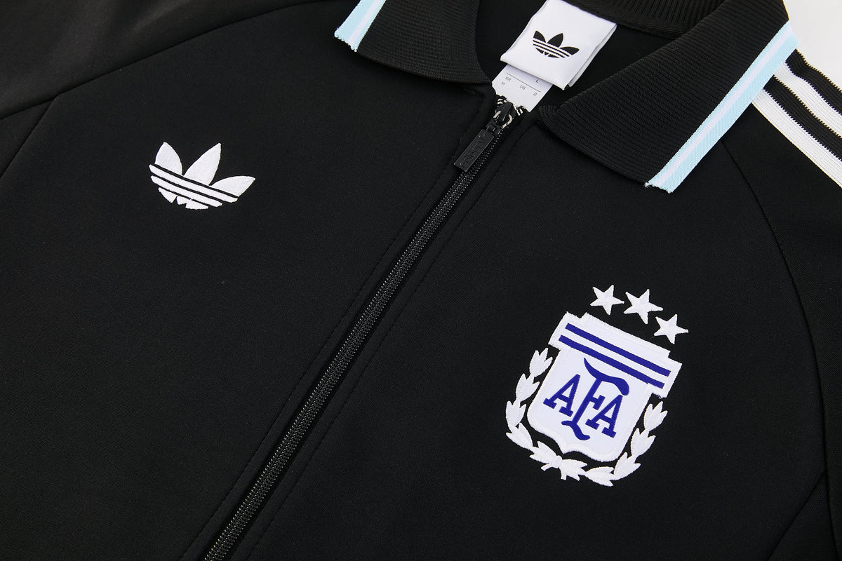 Tuta Argentina zip 26-27 nero righe bianche