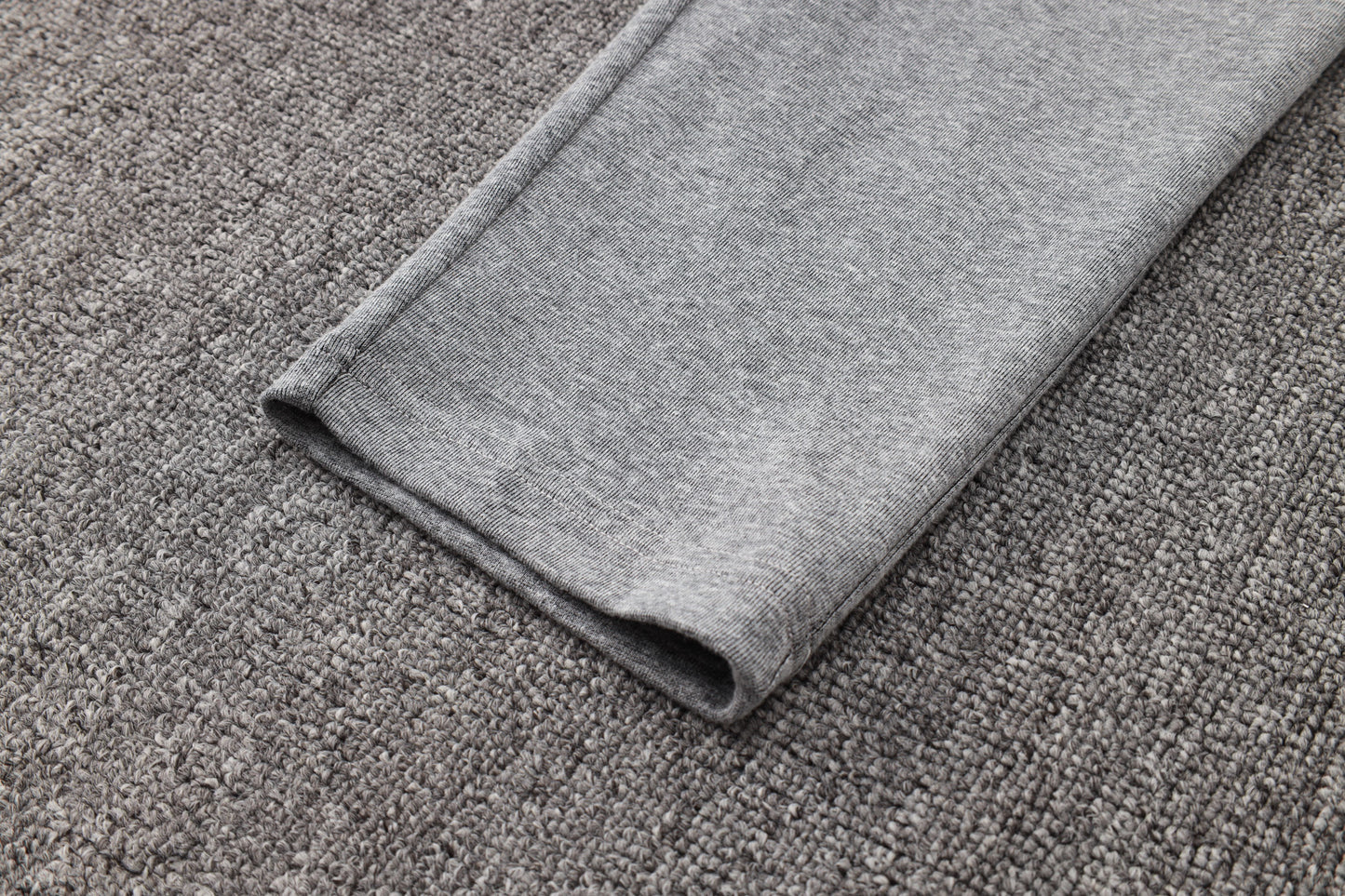 Tuta Sport grigio cuciture nero con cappuccio