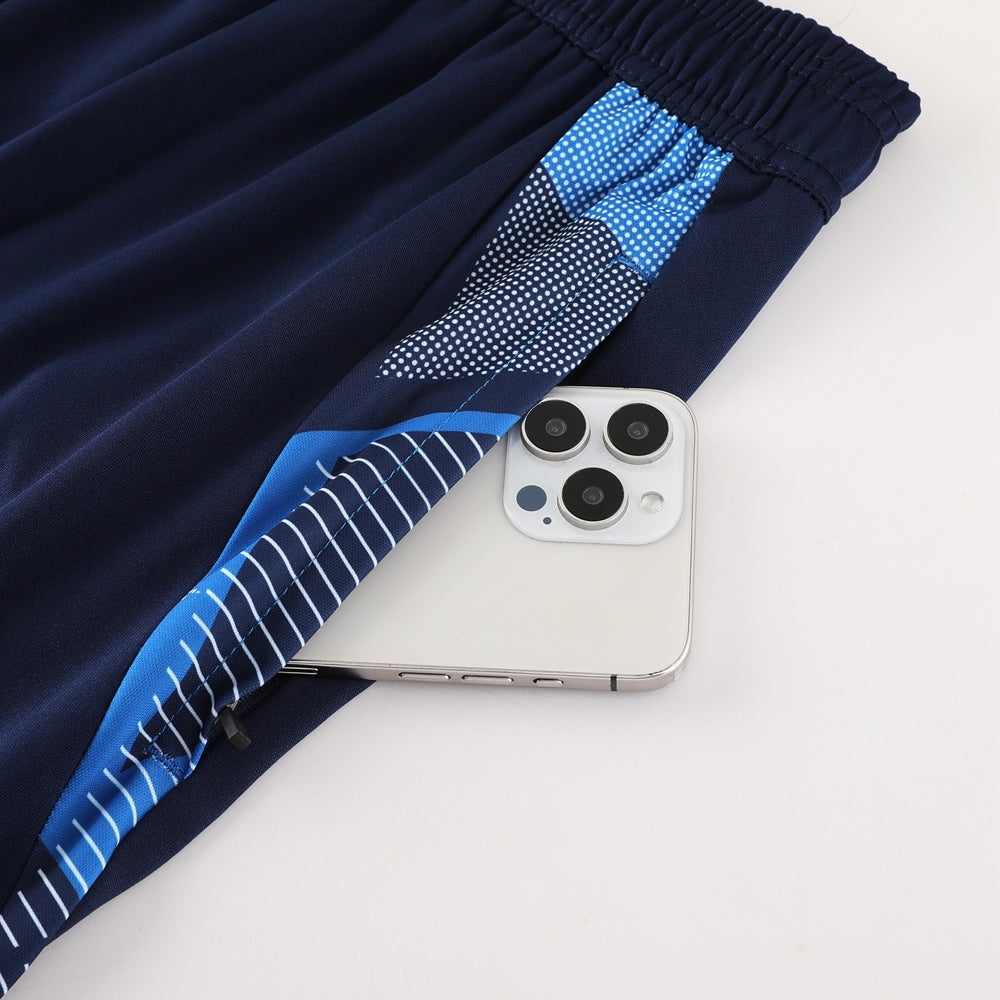 Completo con pantaloncini bicolor azzurro