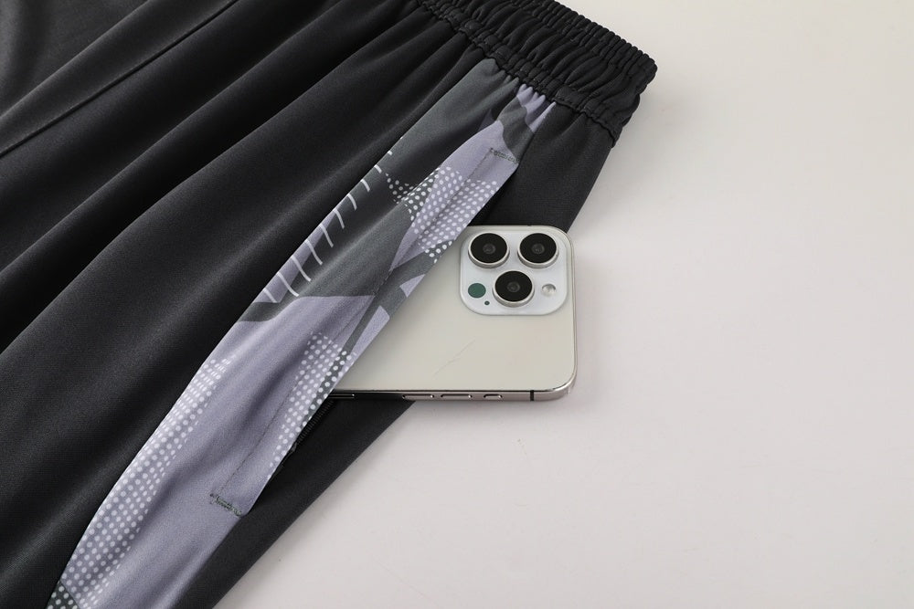 Tuta Sport nero e verde fluo