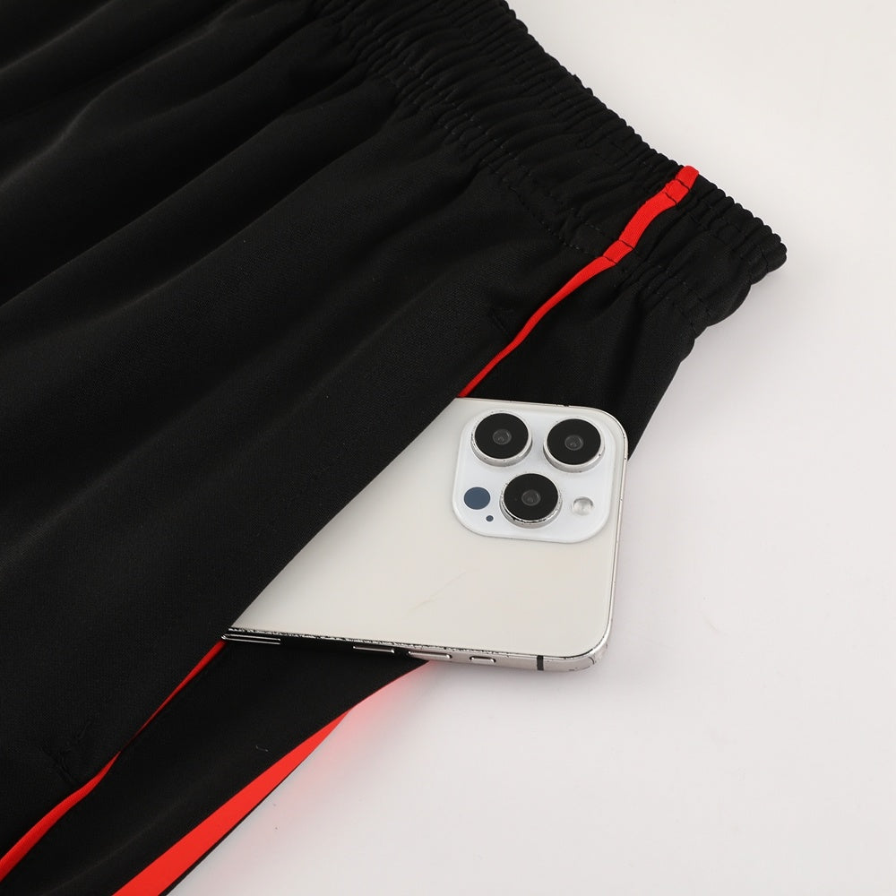 Completo con pantaloncini righe spalle rosso