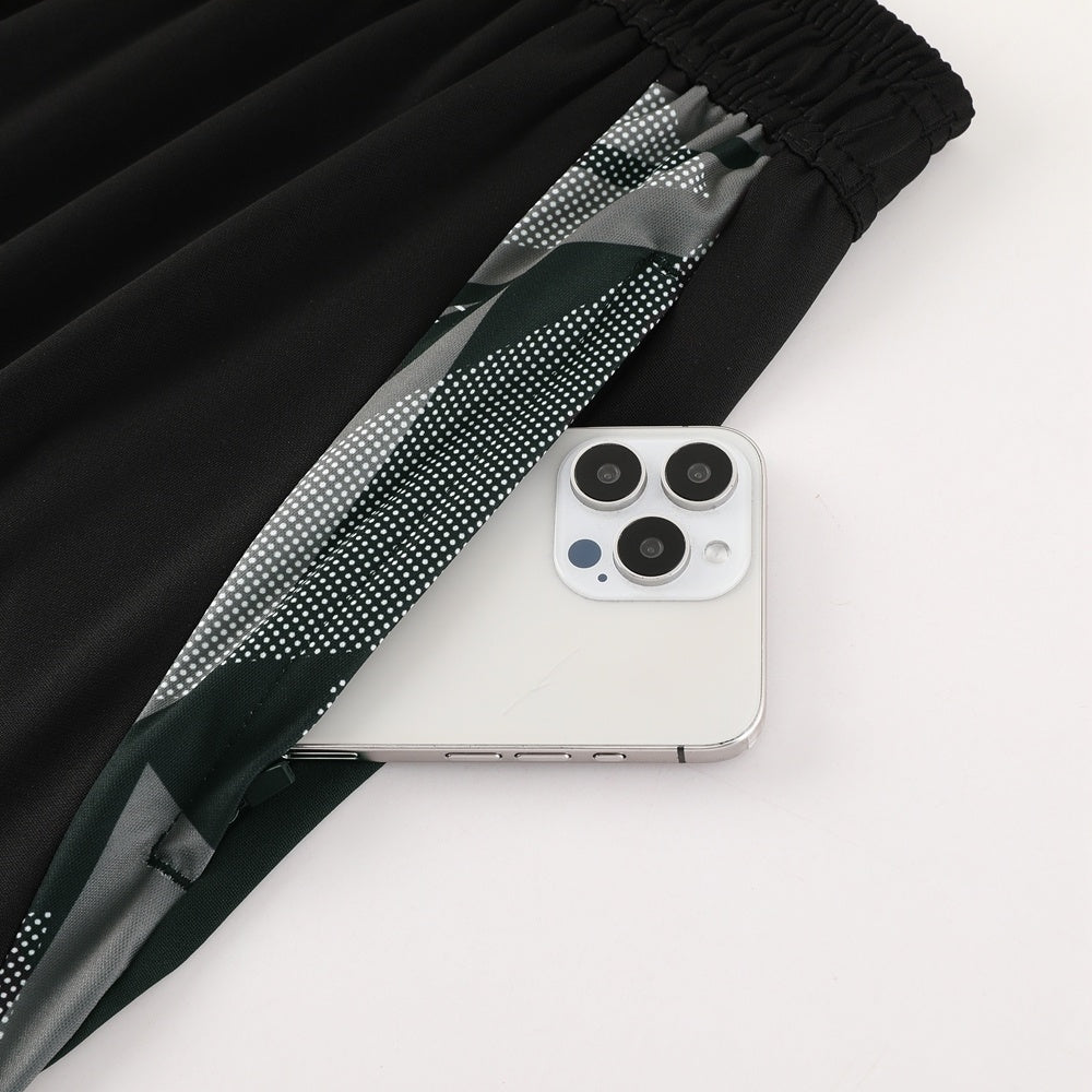 Completo con pantaloncini bicolor nero