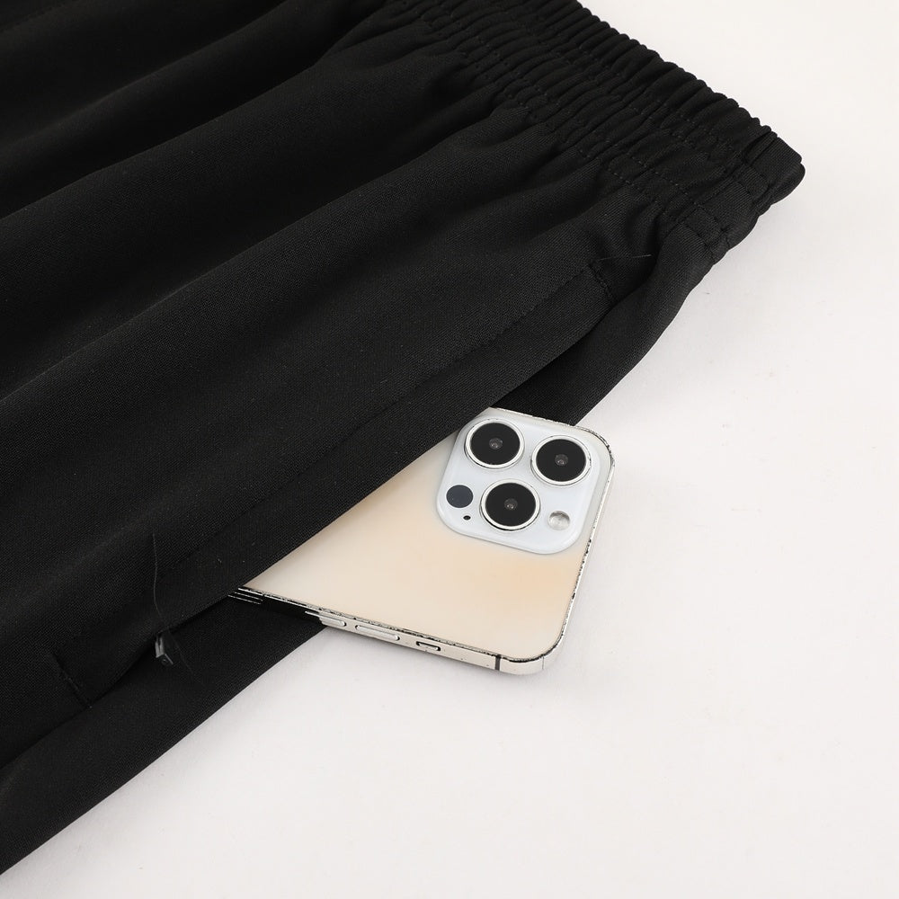 Completo con pantaloncini dettagli fantasy nero