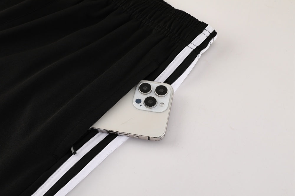 Completo con pantaloncini doppia riga nero