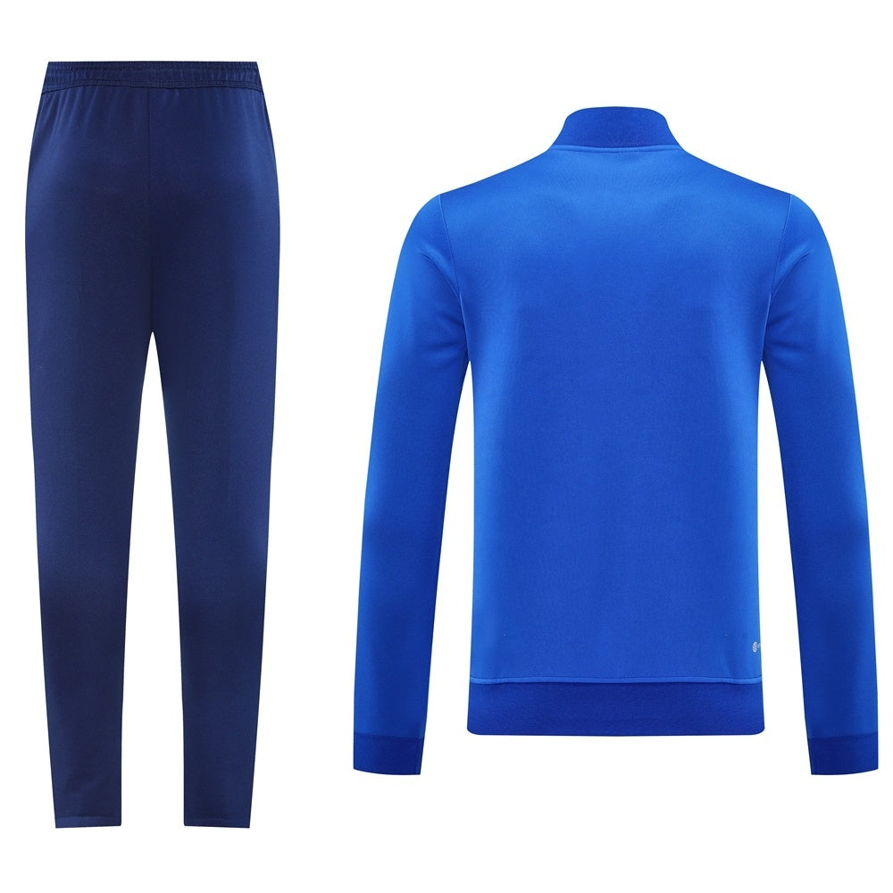 Tuta Sport blu riga bianca