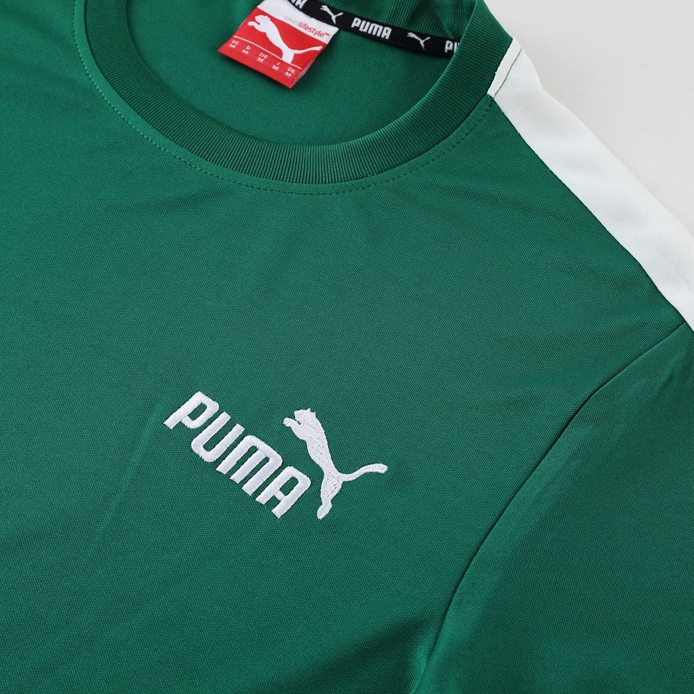 Completo con pantaloncini verde fascia bianca