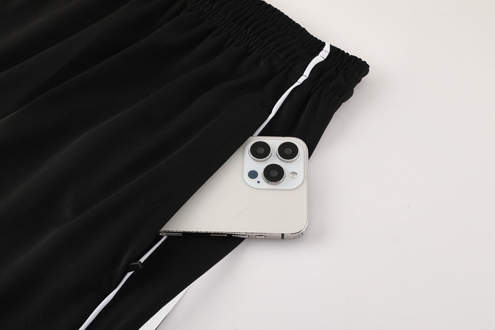 Completo con pantaloncini righe spalle azzurro e nero