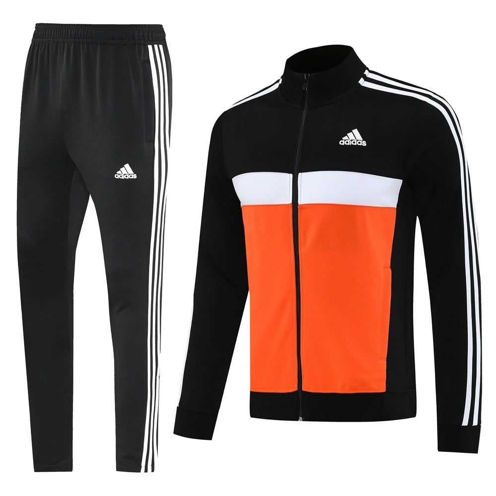 Tuta Sport nero e arancione riga bianca