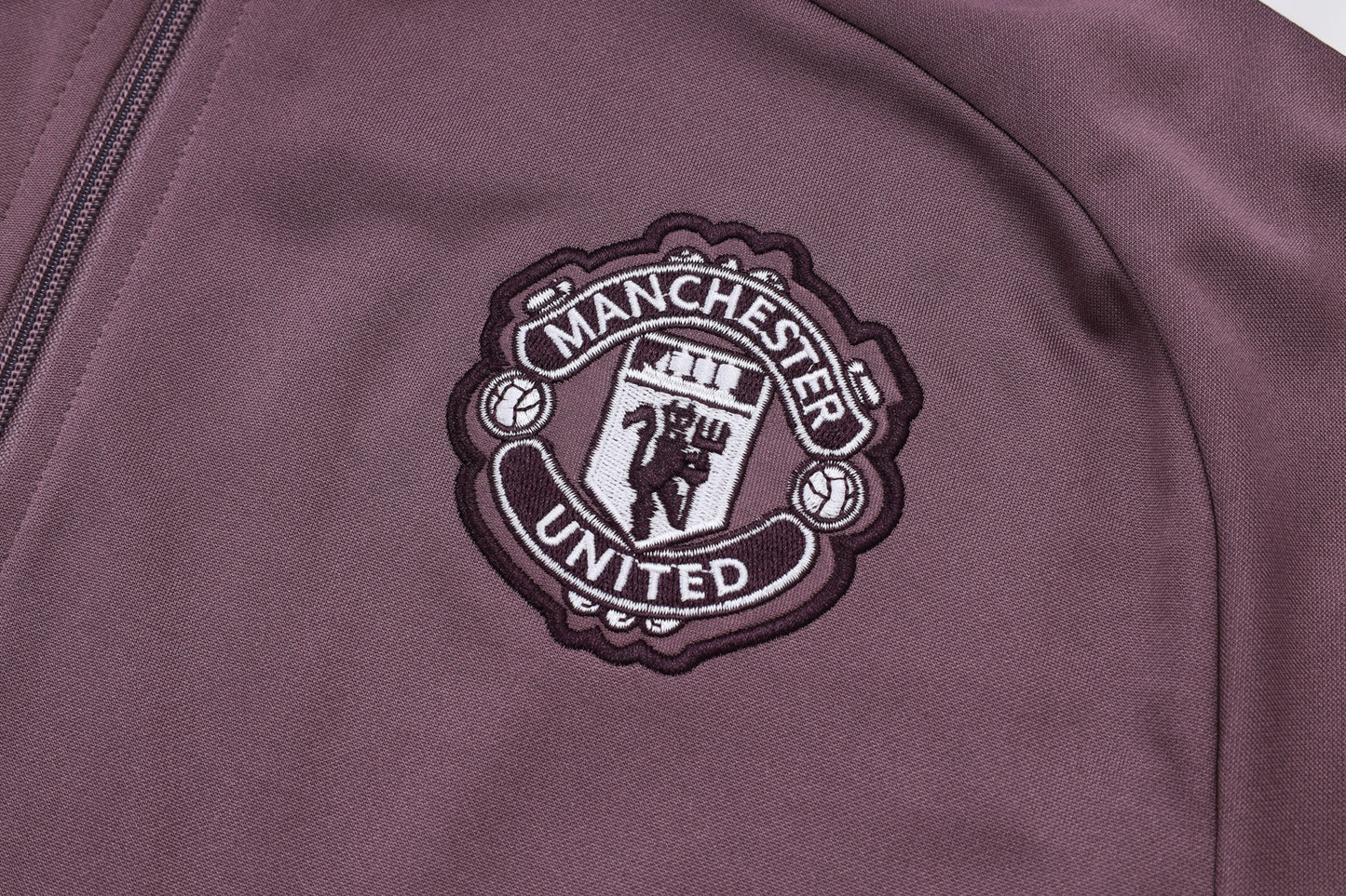Tuta Manchester United prugna zip intera 2025/26
