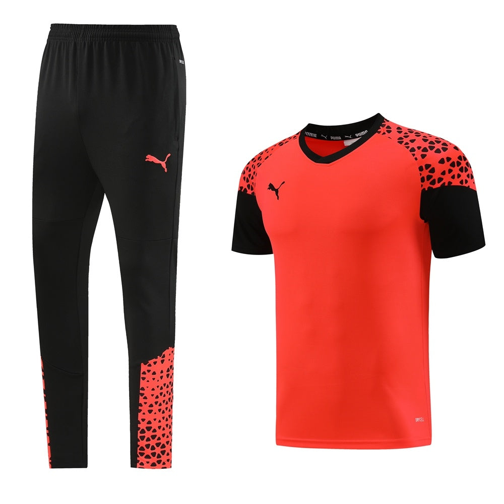 Completo con pantaloni lunghi dettagli fantasy arancione