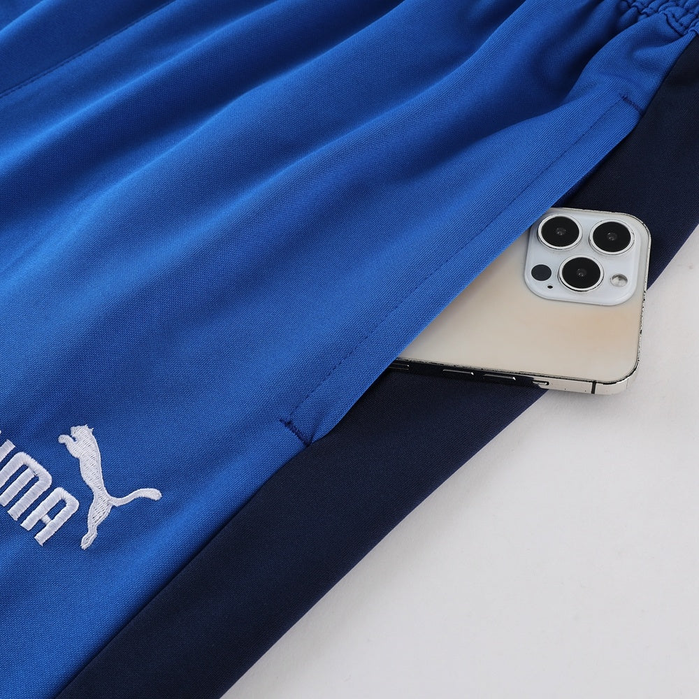 Completo con pantaloncini azzurro fascia blu