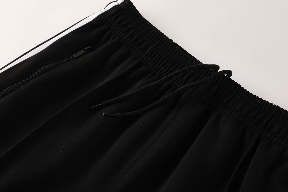Tuta Sport nero riga bianca OUTLET