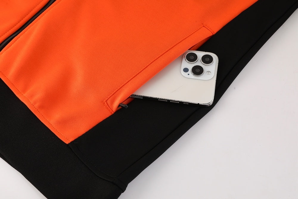 Tuta Sport nero e arancione riga bianca